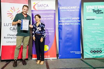 Tom Cobban receives a “Stellar Stakeholder Service Award” at the South Australian Financial Counsellors conference - Adelaide - November 2024